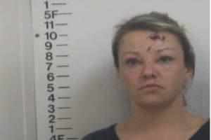 ERICA MOORE - UNLAWFUL POSS OF WEAPON, MAN:DEL:SELL CONTROLLED SUBSTANCE